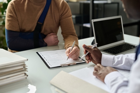 Attorney works with an injured client