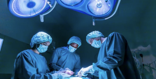 doctors performing an operation